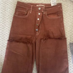Light brown Levi’s jeans